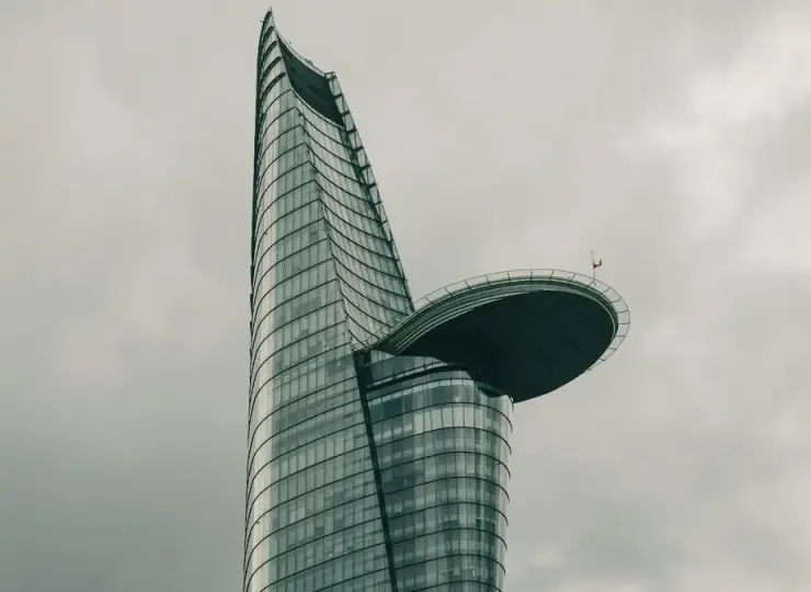 Bitexco Financial Tower rising above modern buildings in Ho Chi Minh City
