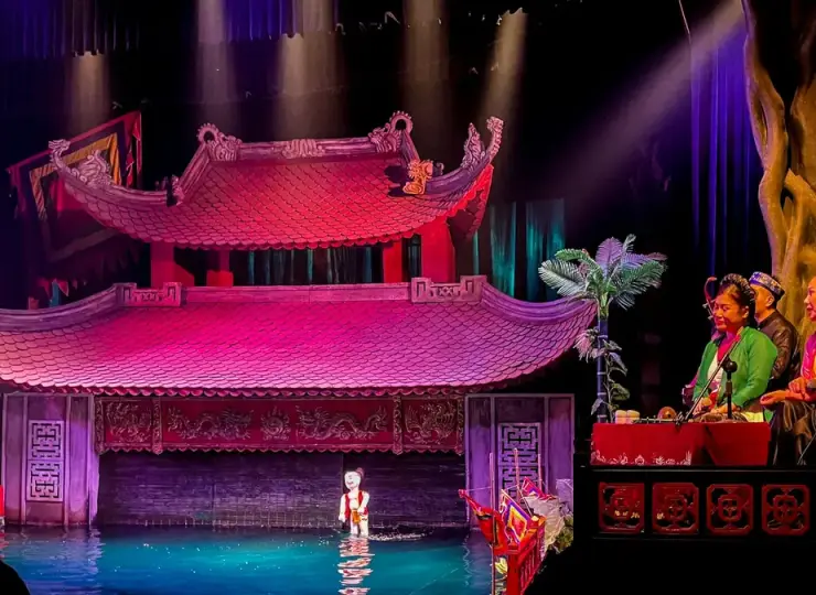 Traditional water puppet show on a colorful stage in Vietnam