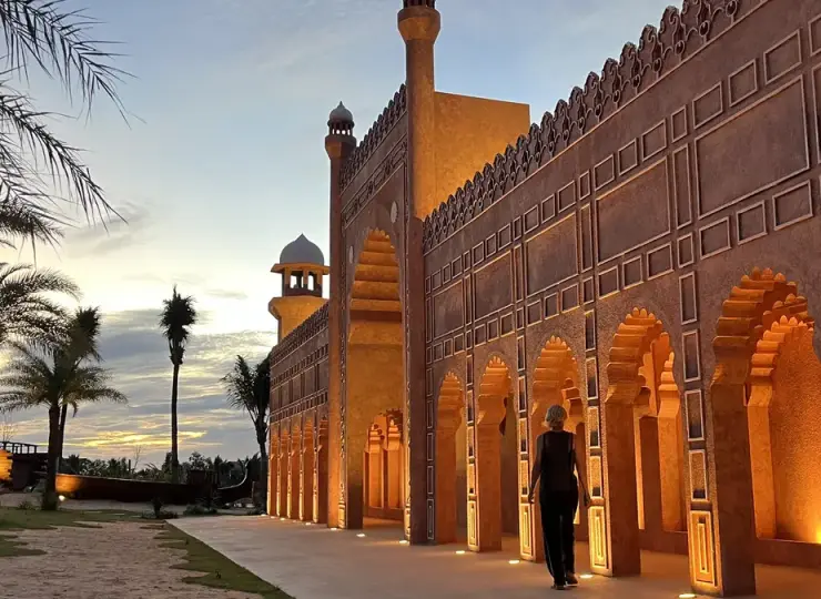 Warm-lit Middle Eastern-style arches and towers at The Silkroad Mui Ne
