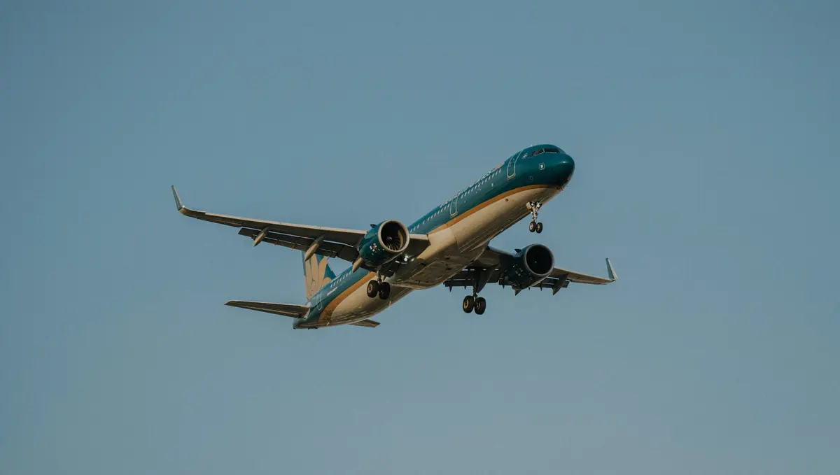 Passenger airplane flying through a clear blue sky