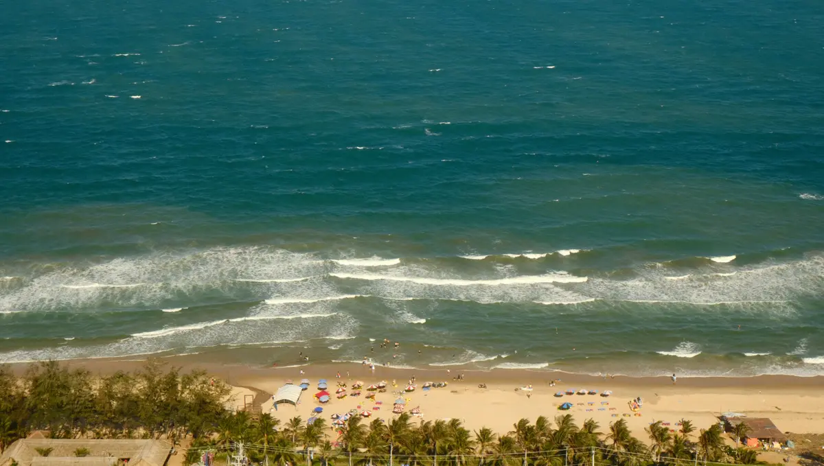 Elevated view of the beach and waves along the Mui Ne coast