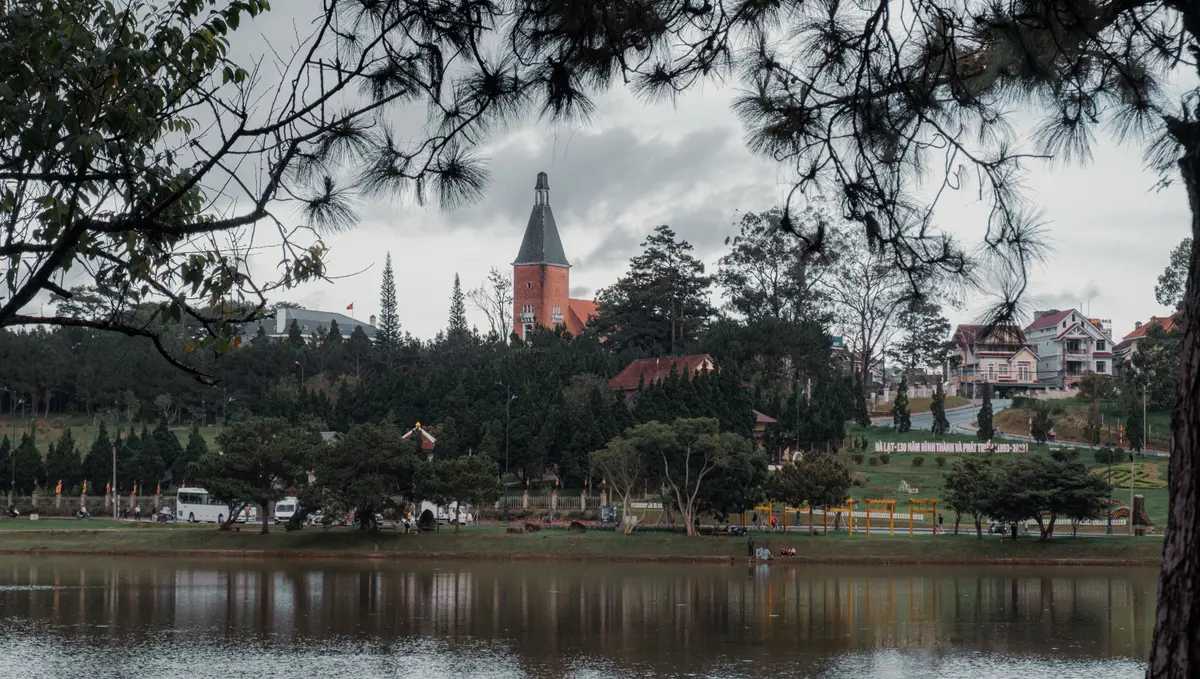 Da Lat cityscape and church viewed across Xuan Huong Lake