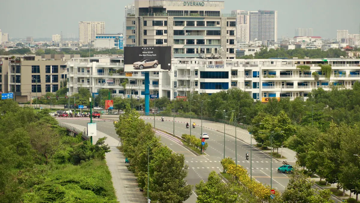 Modern apartments and a tree-lined road in Thao Dien, Ho Chi Minh City